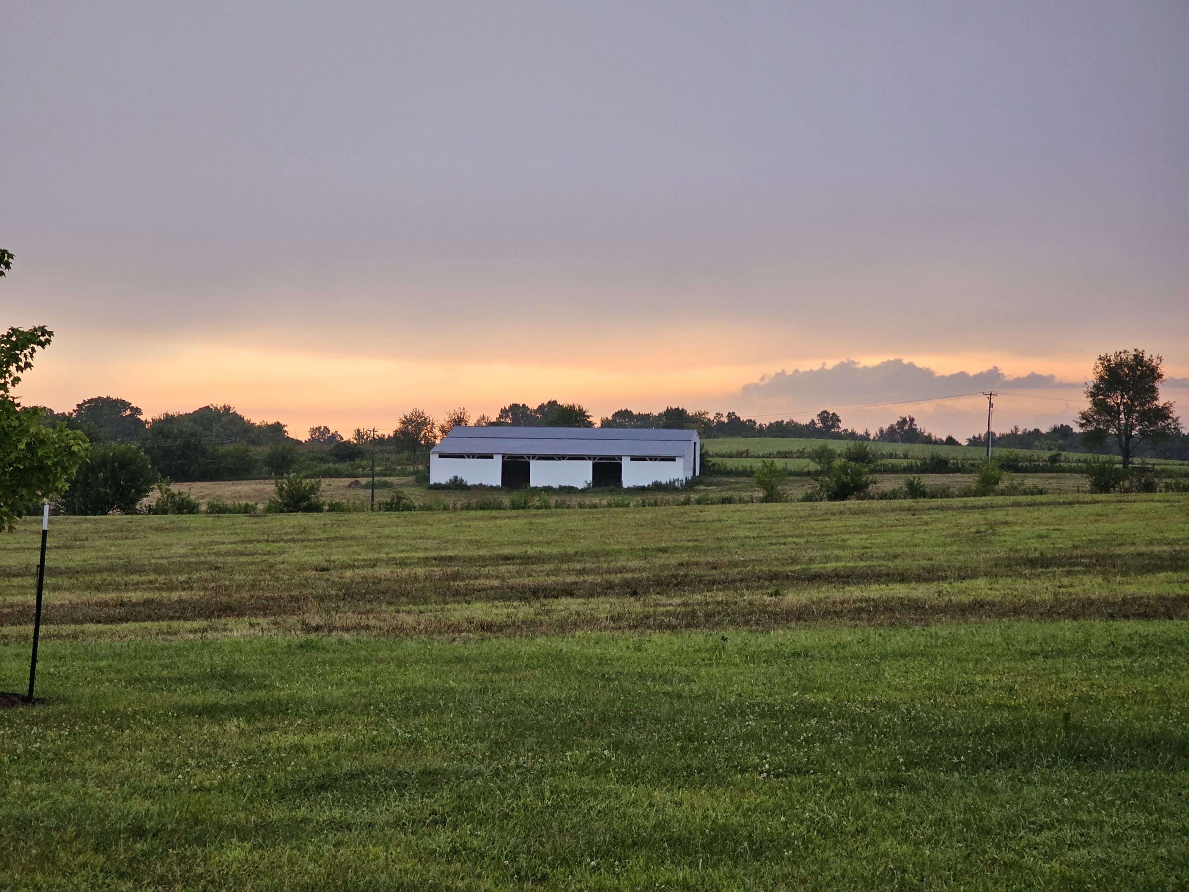 Kentucky farm and barn at dusk