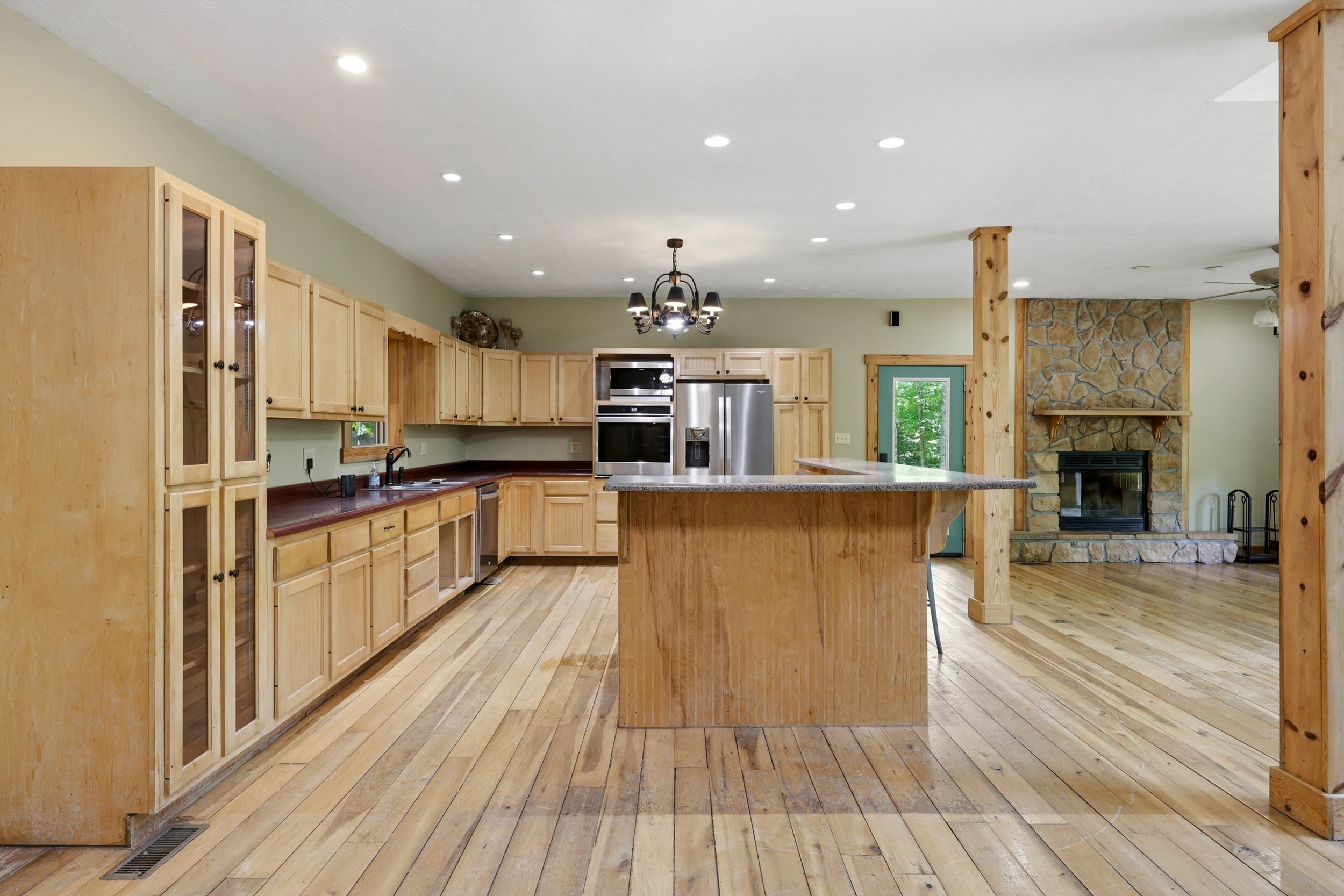 Kitchen with natural materials and hardwood flooring