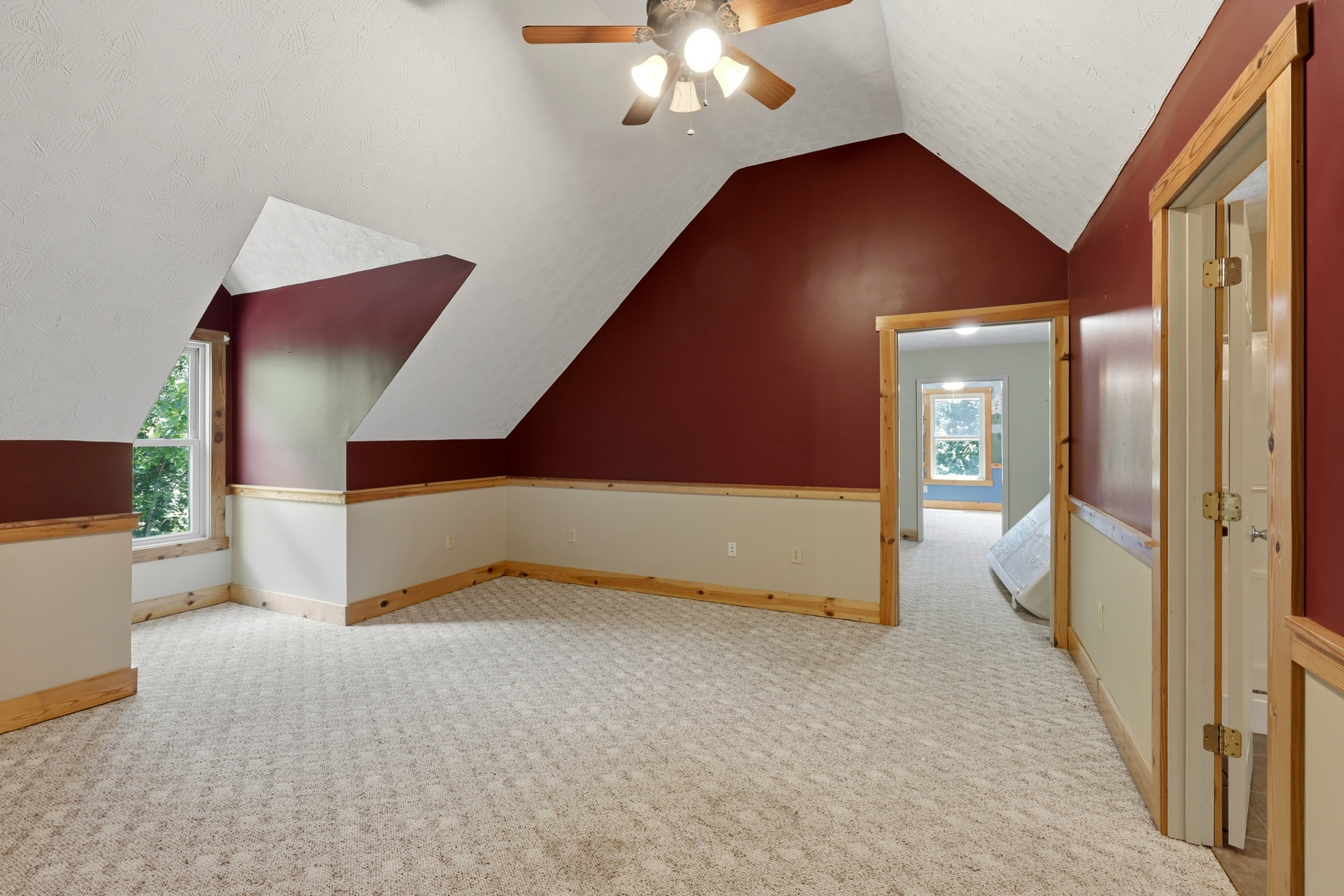 Spacious bedroom suite with vaulted ceiling