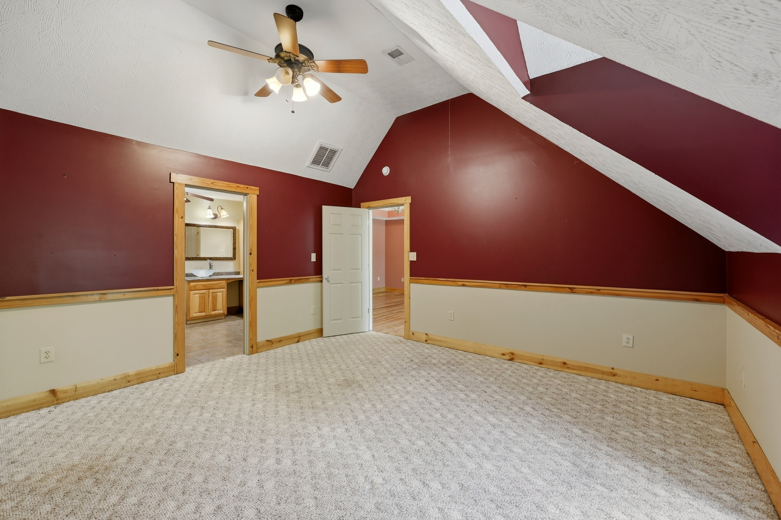 Bedroom suite with walk-in closet and bath access