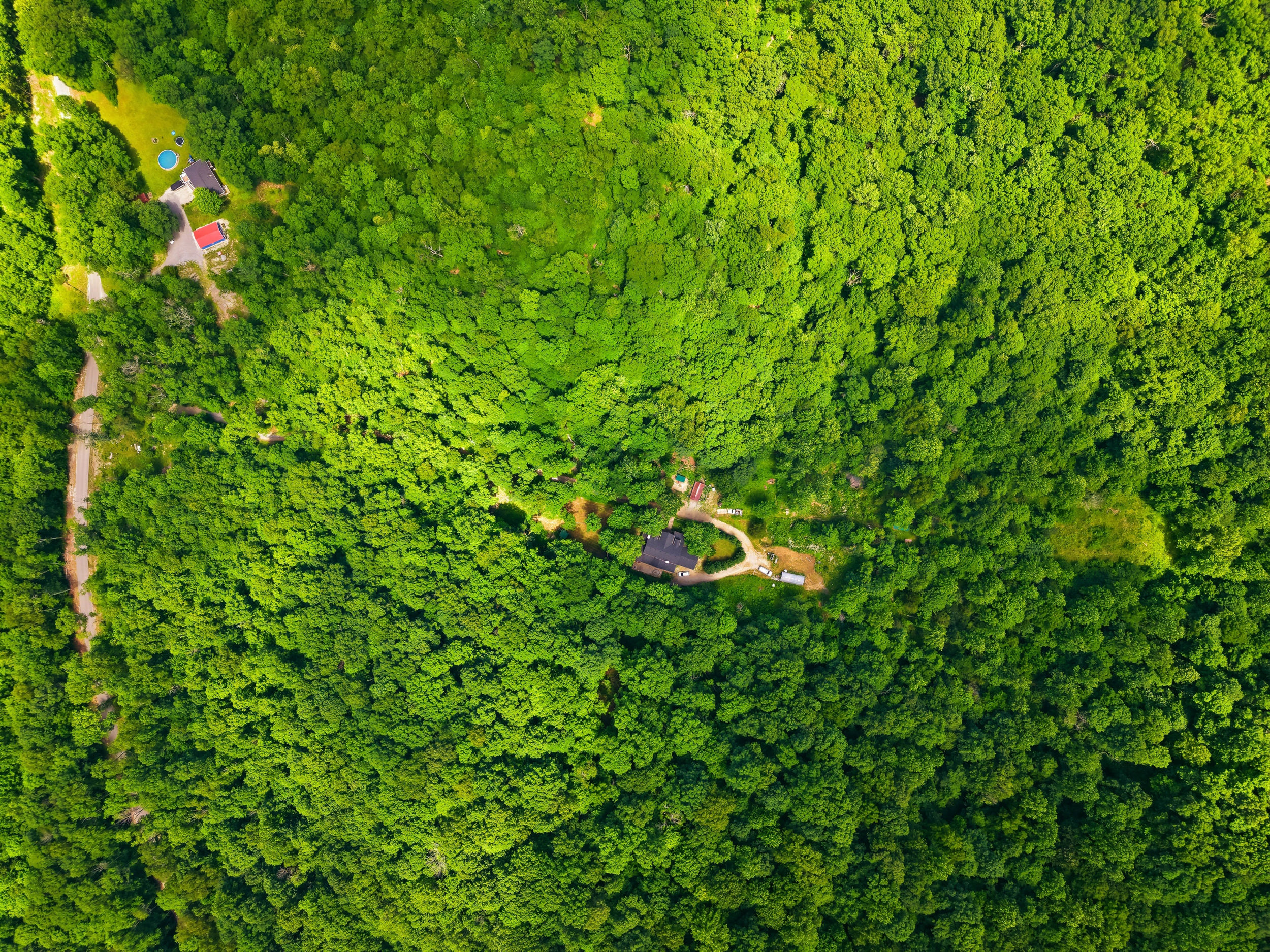 Aerial showing home and separate lot