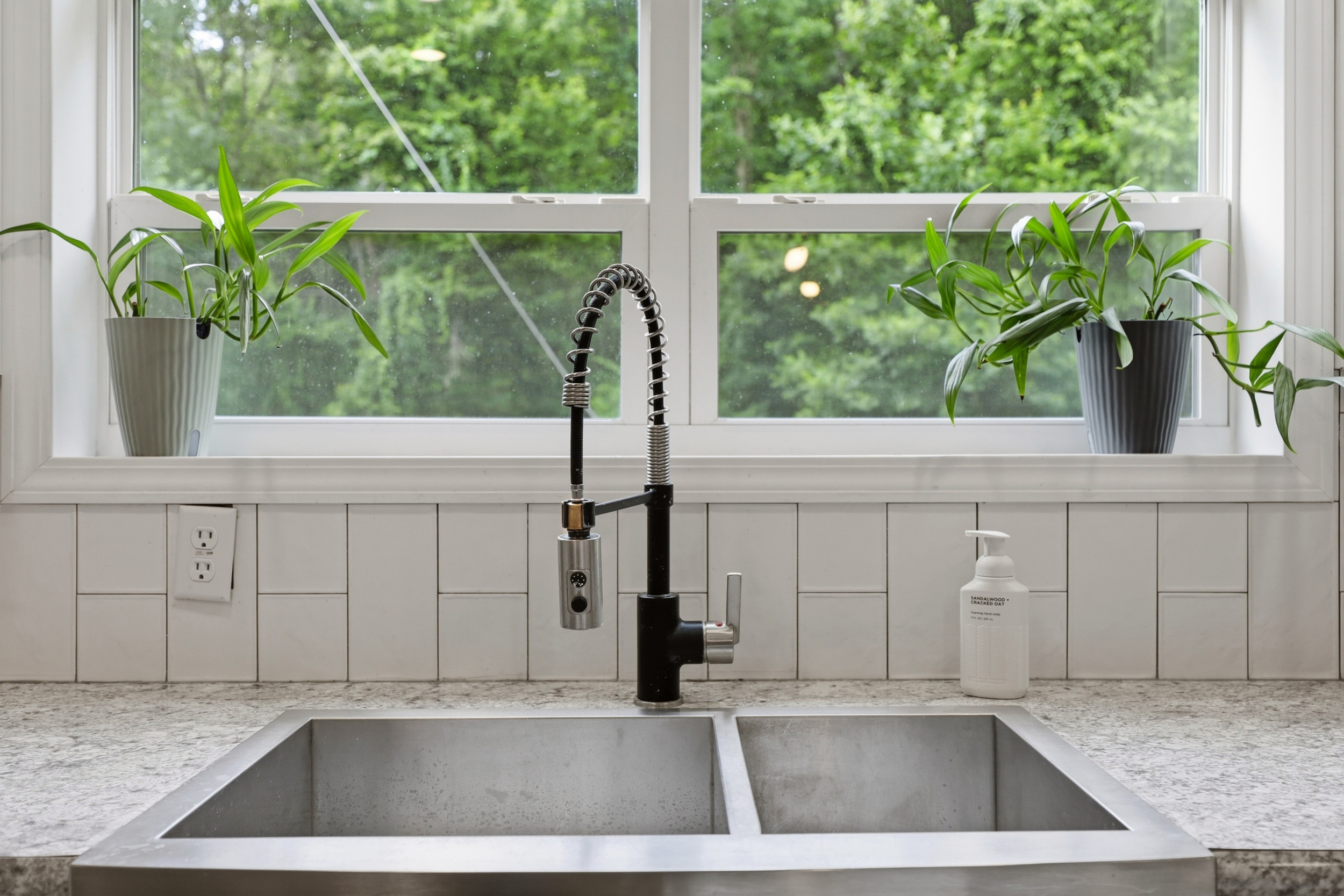Farmhouse sink with forest view
