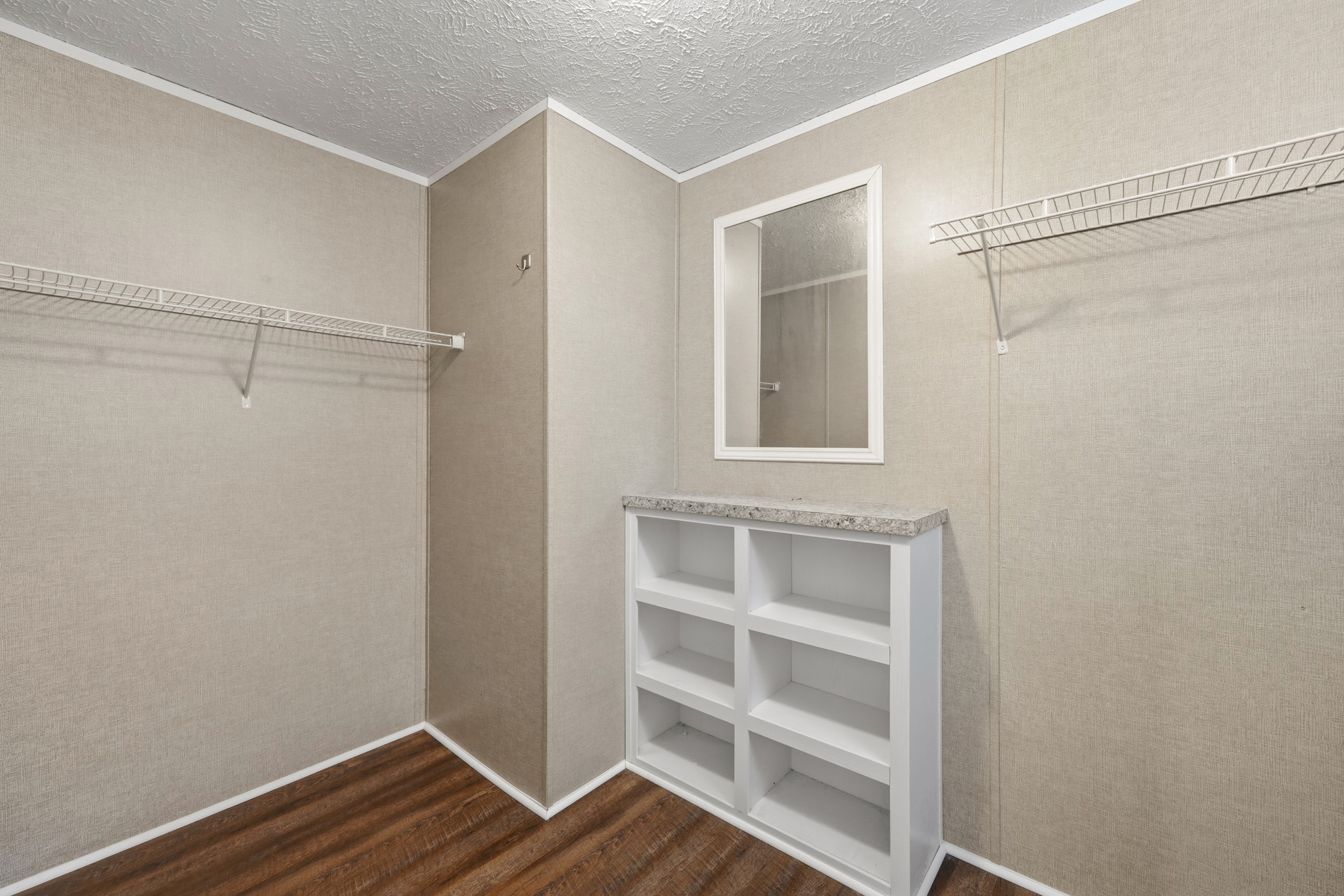 Walk-in closet with built-in shelving