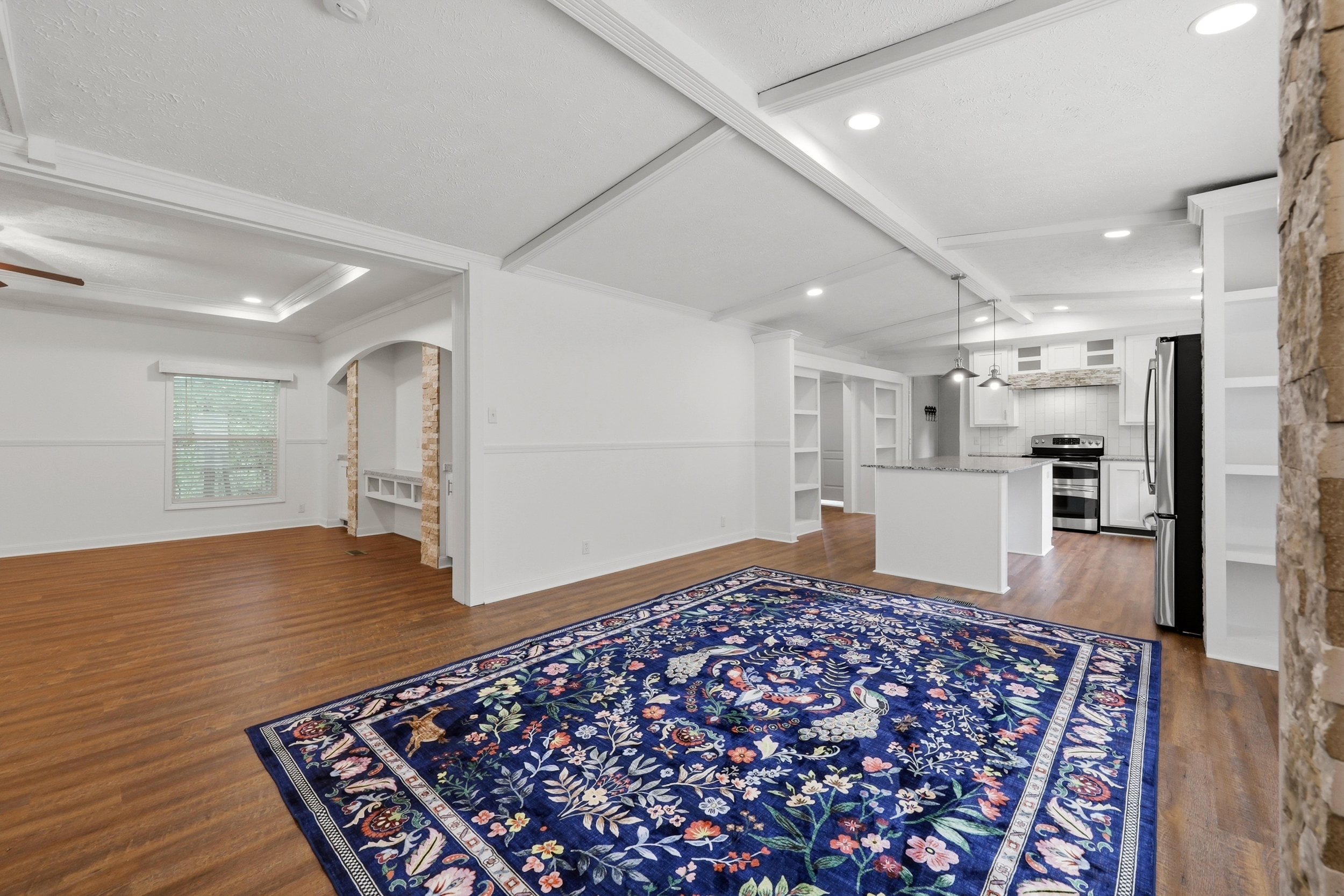 Open living area with vaulted ceilings
