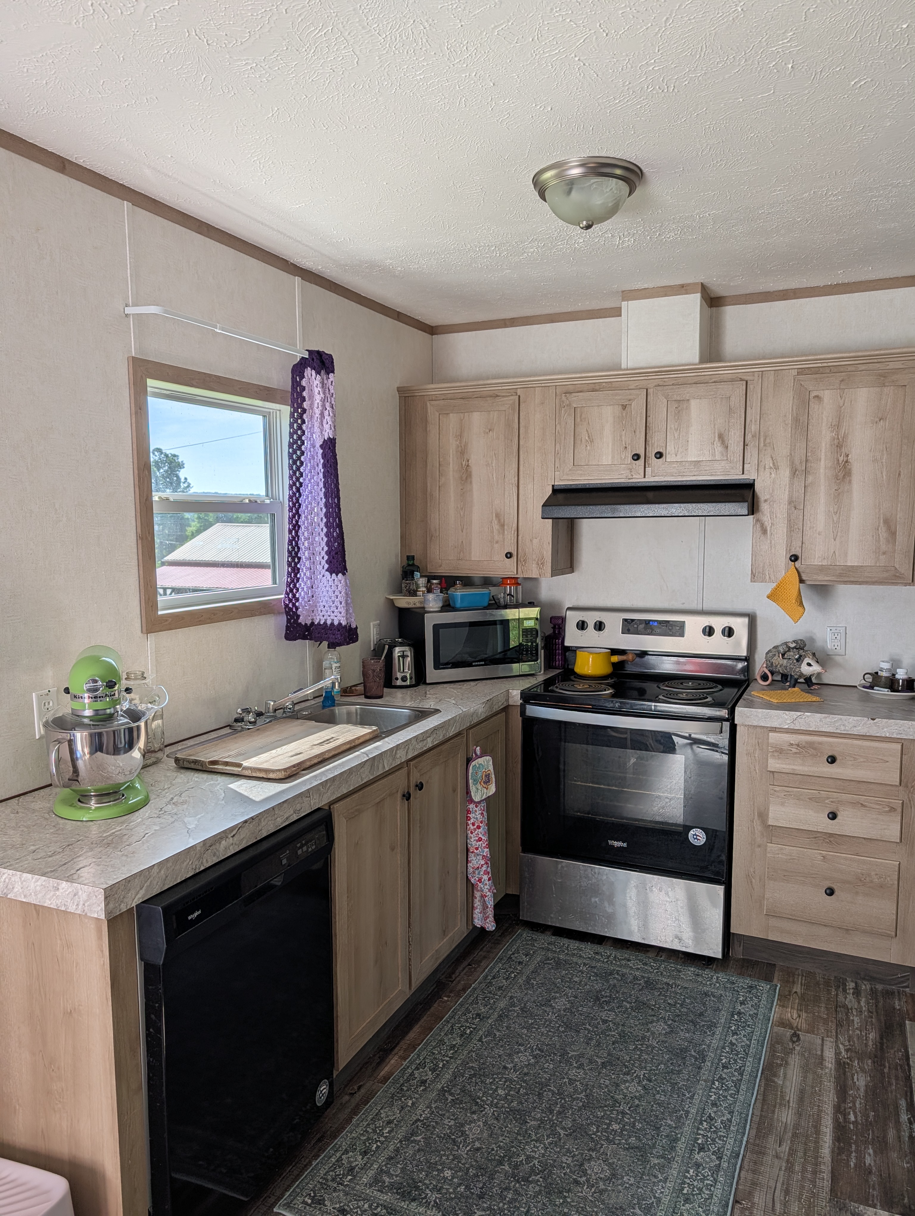 Second home kitchen with stainless appliances