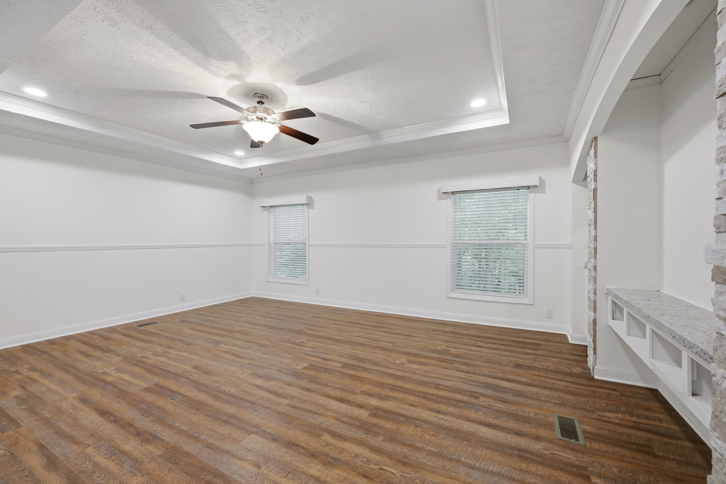 Primary living area with tray ceiling
