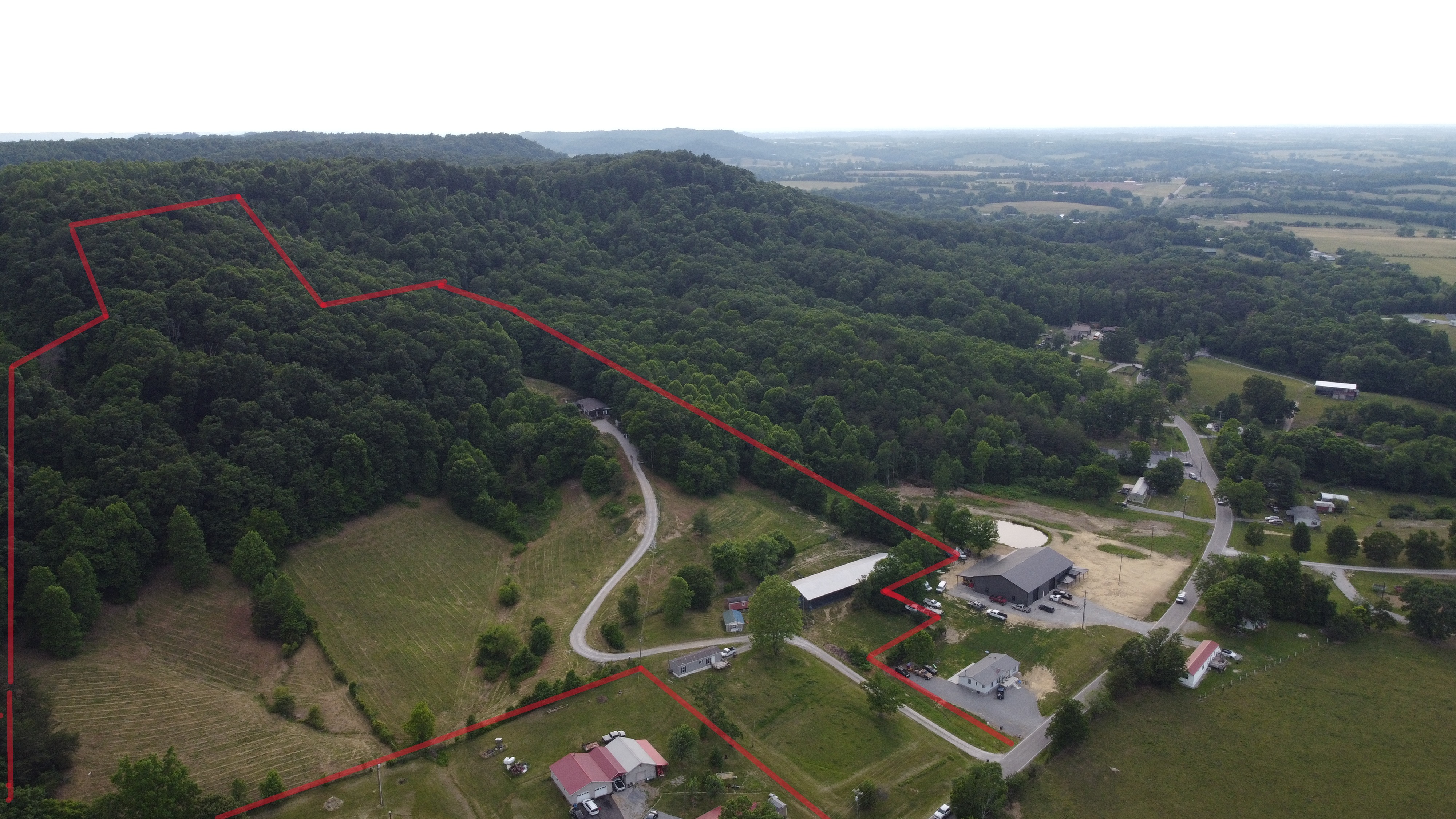 Aerial view of 20-acre homestead in Berea, Kentucky with property boundaries