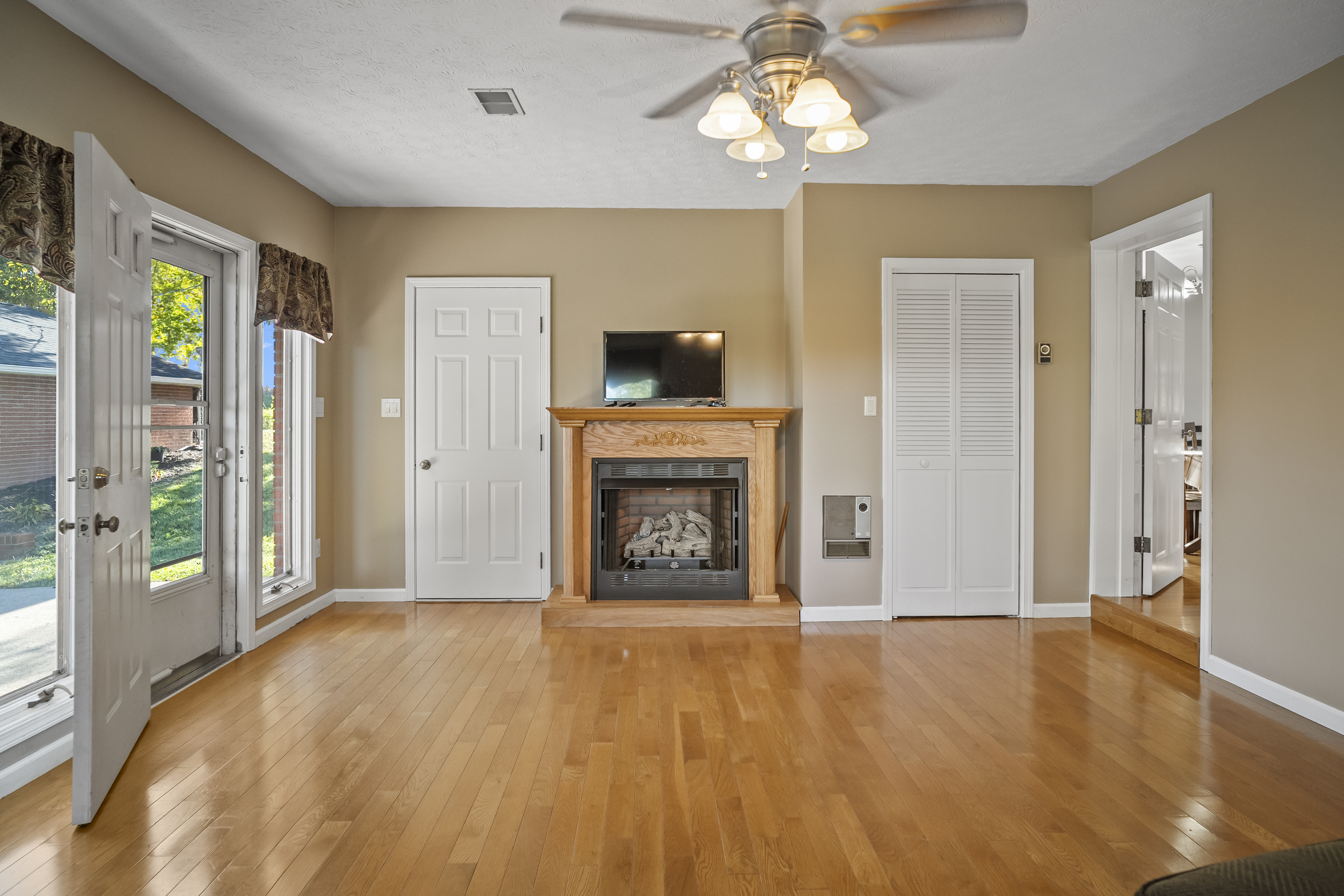 Family room with fireplace and french doors