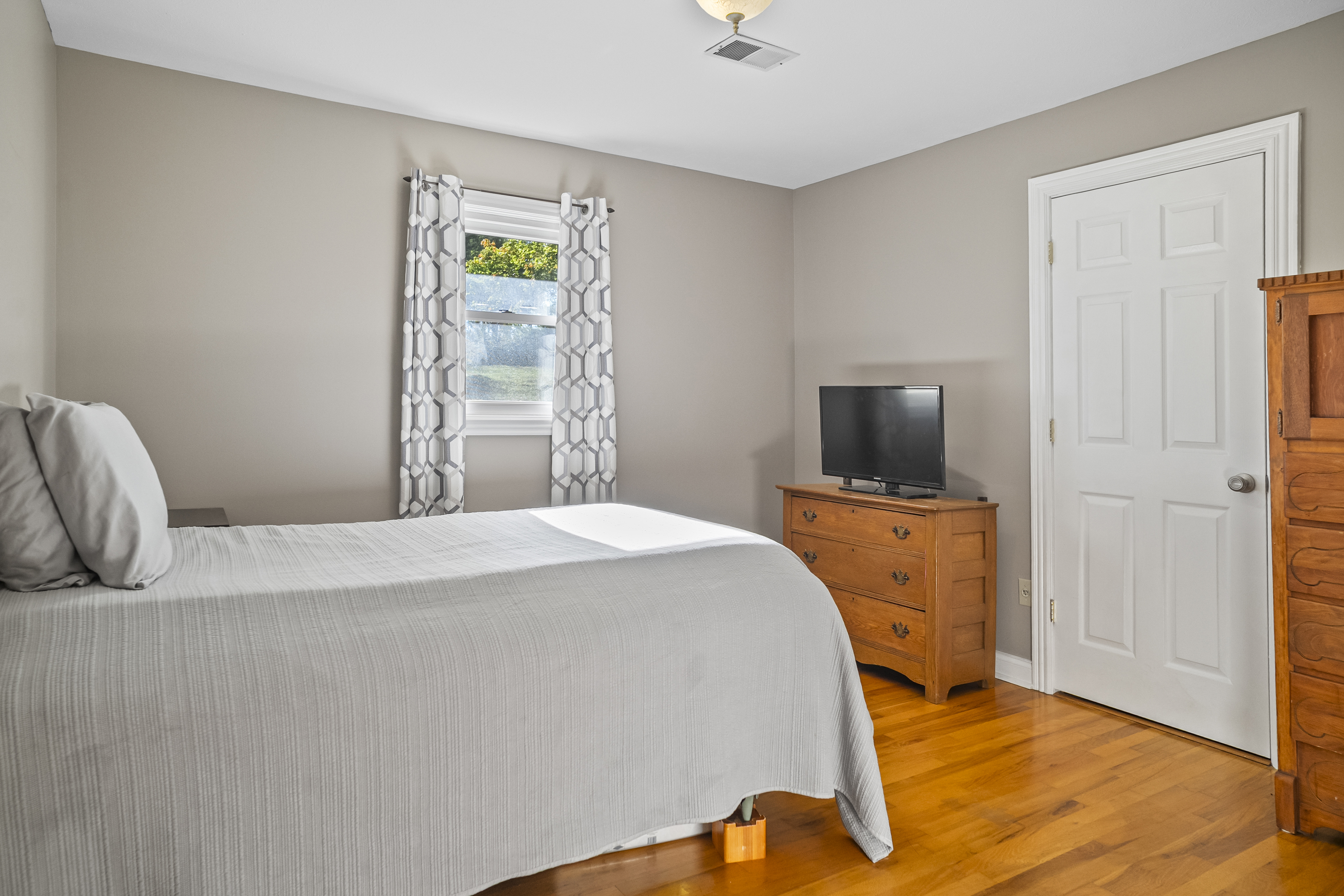 Bedroom with hardwood floors