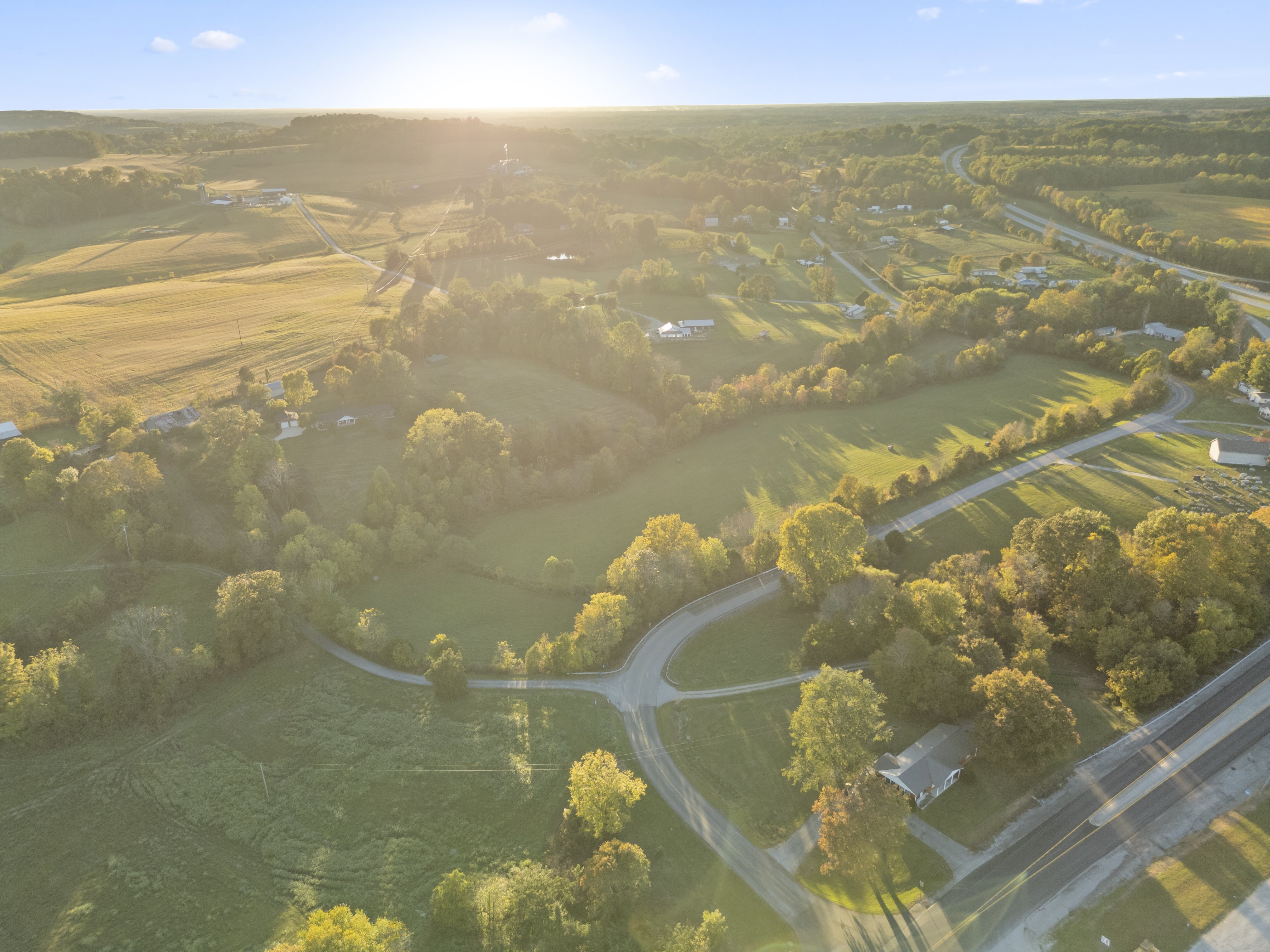 Aerial view of 20-acre property on Faubush Road at golden hour