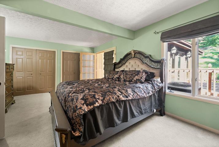 Primary bedroom with double closets