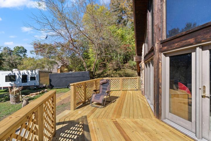 Side deck off the home with seating area