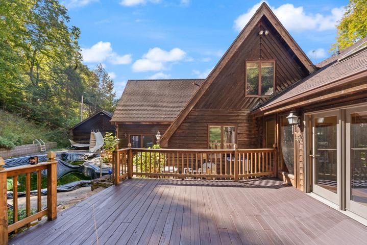 View from the deck overlooking the private wooded acreage
