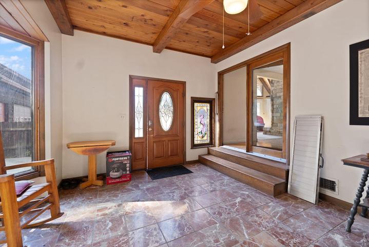 Foyer entrance with view into the home
