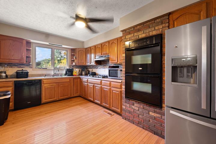 Kitchen workspace with storage and new disposal