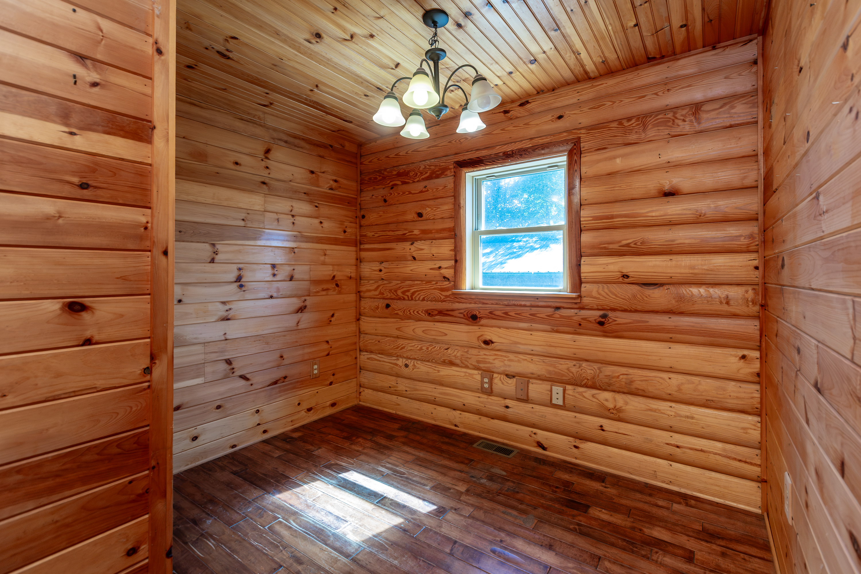 Office or bonus room with log walls
