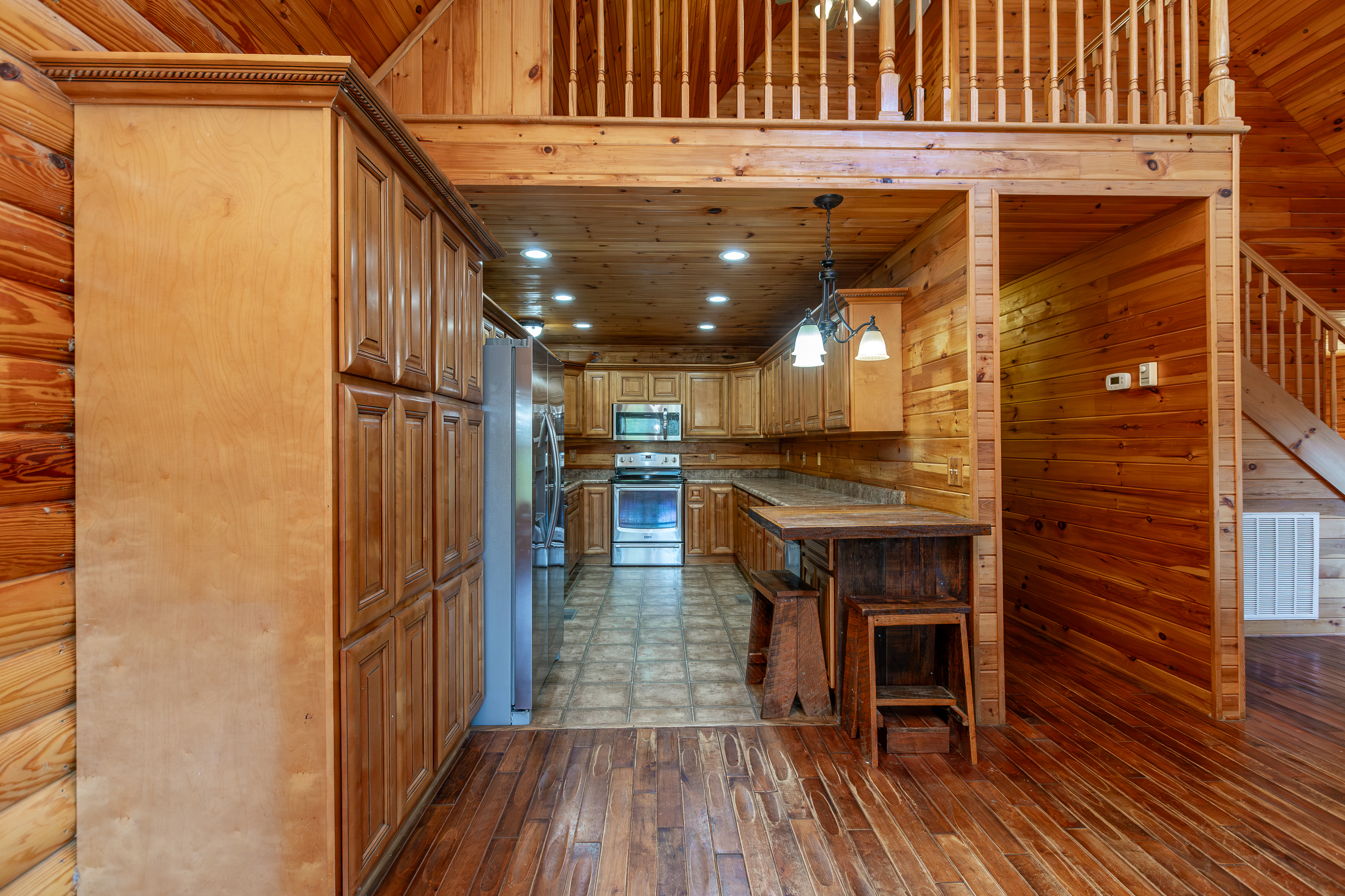 Kitchen with granite countertops and stainless appliances