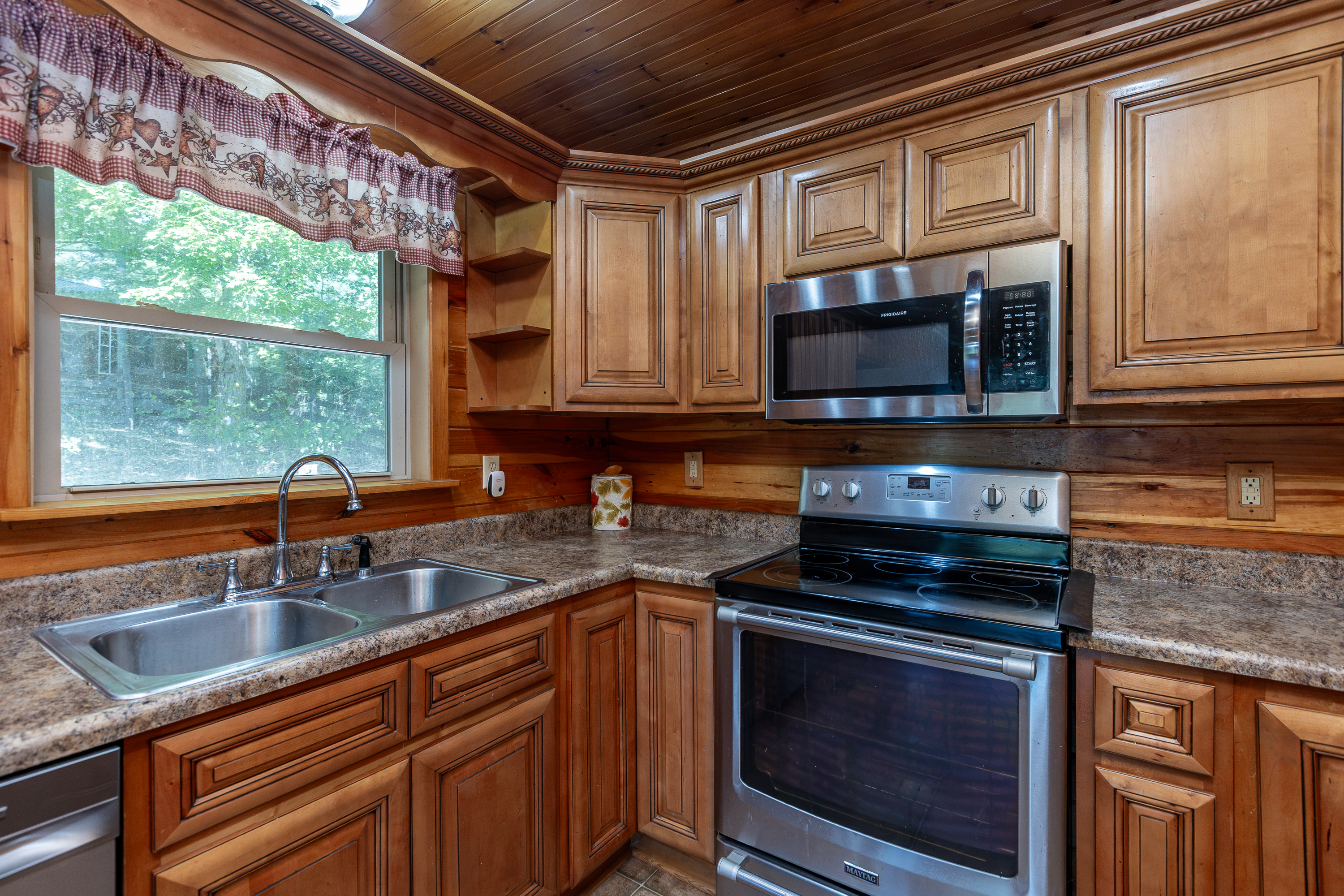 Kitchen workspace with log walls