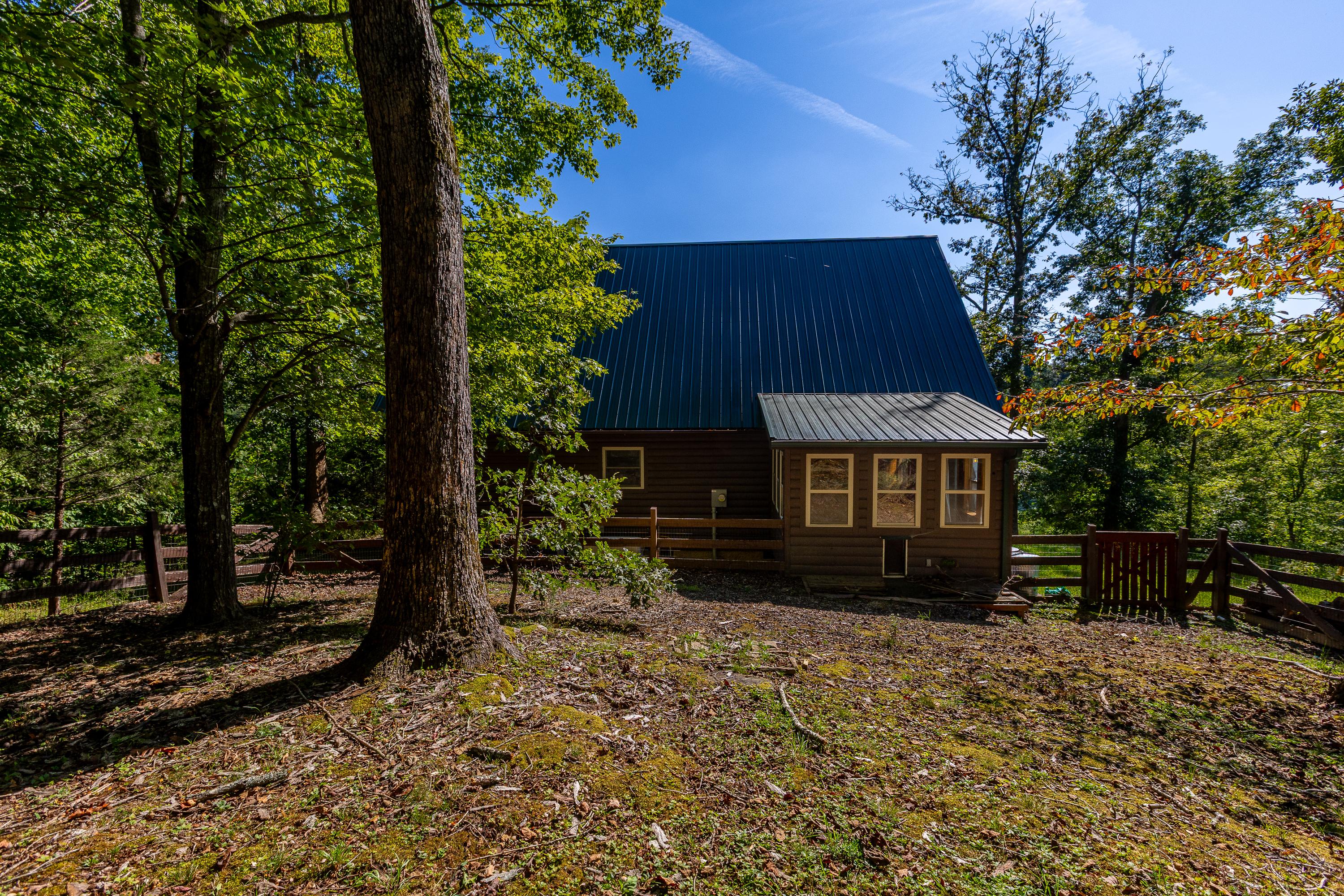 Guest house exterior set among trees
