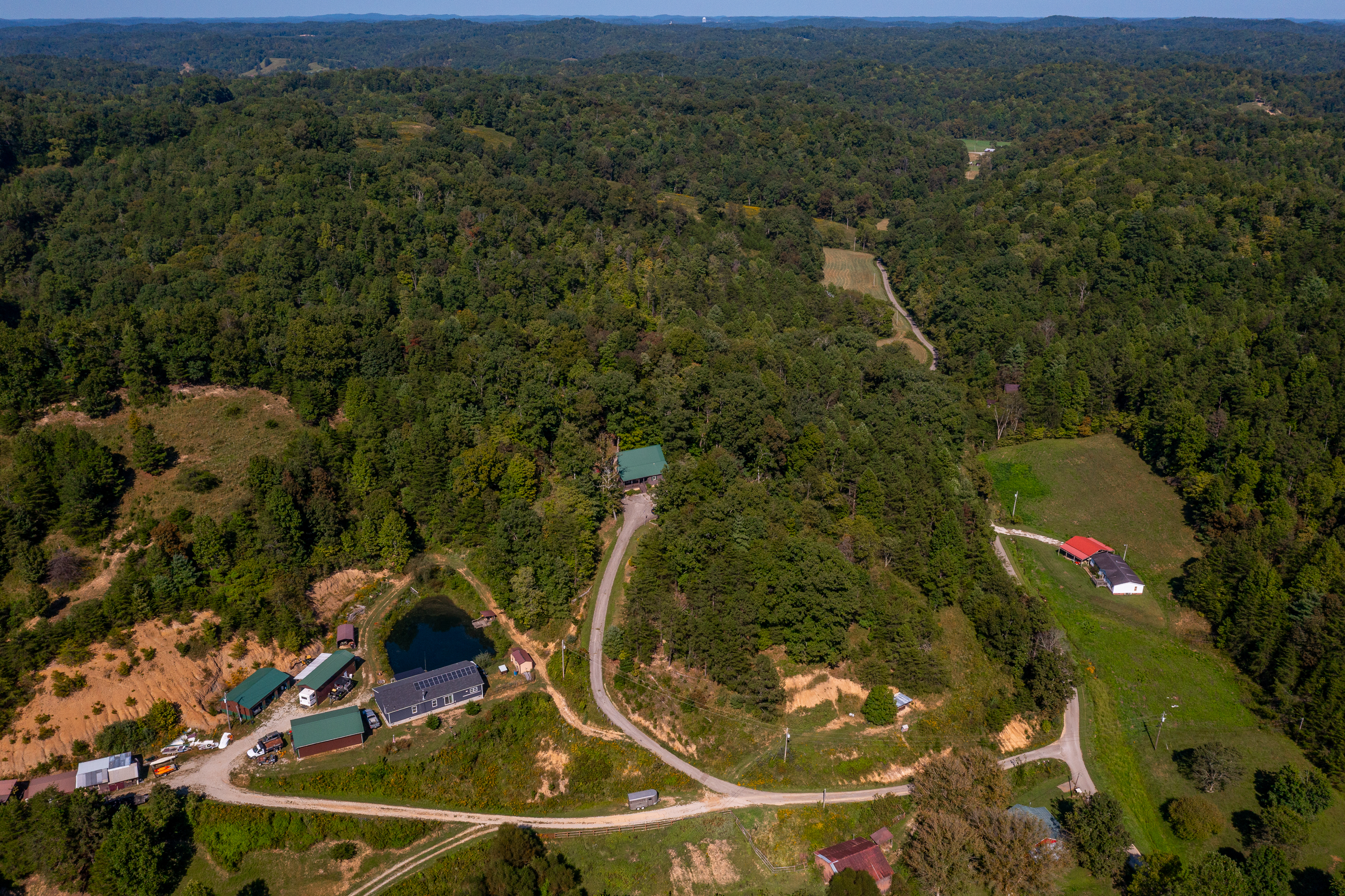 Aerial view showing hilltop setting with mountain views