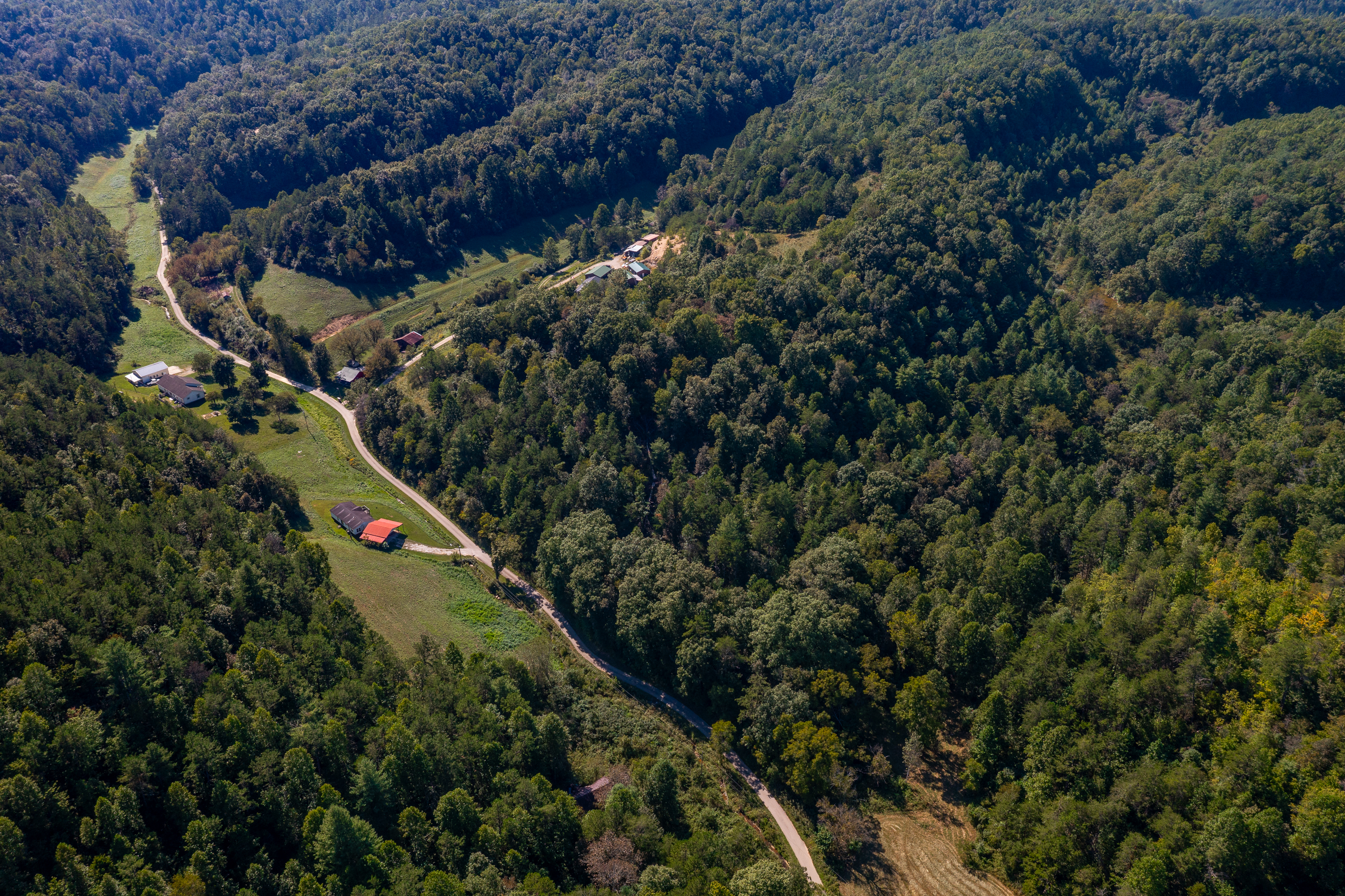 Aerial view of property road and setting